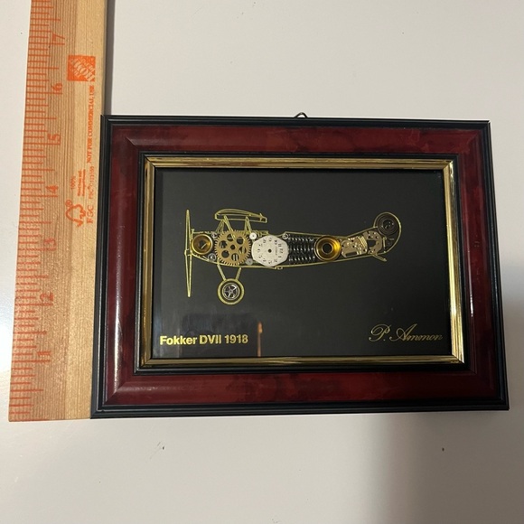 framed piece of art featuring a representation of an airplane with clock pieces - Picture 9 of 10